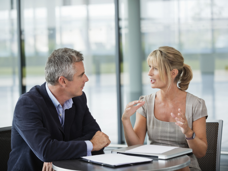 people speaking in work environment